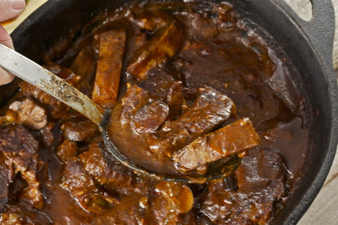 Spoonful of short ribs--Cajun cooking at its best.