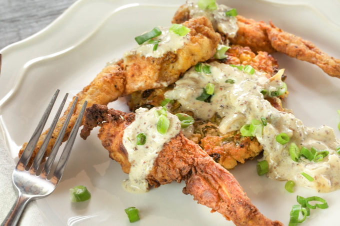 Crunchy frog legs have a subtle flavor that goes well with a spicy sauce in this tasty Buttermilk Fried Frog Legs recipe. (All photos credit: George Graham)