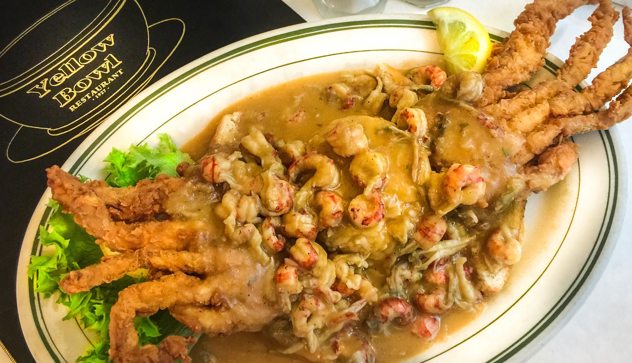 Fried Softshell Crab topped with Crawfish Étouffée is a rural