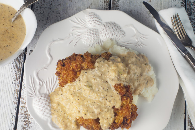Crispy potato chip-crusted, Cajun-Fried Steak crowned with a velvety boudin cream gravy in a classic Cajun recipe. (All photos credit: George Graham)