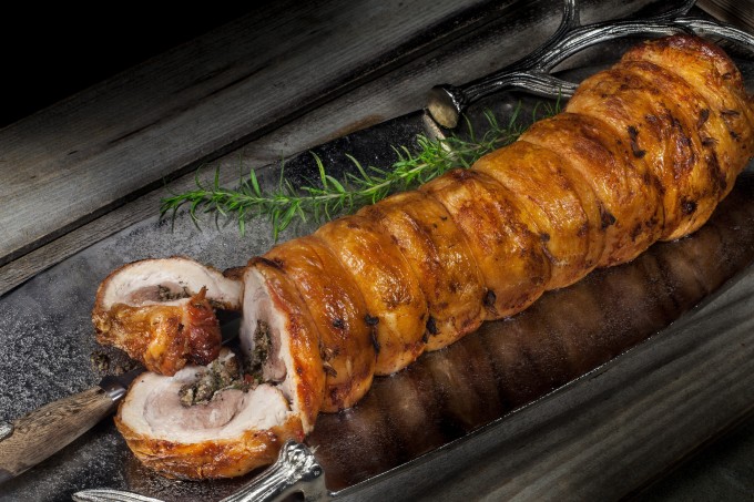 Pork Belly Porchetta Stuffed, tied, and roasted, this pork belly transforms into a Cajun Pork Belly Porchetta -- a porky Cajun recipe. (All photos credit: George Graham)
