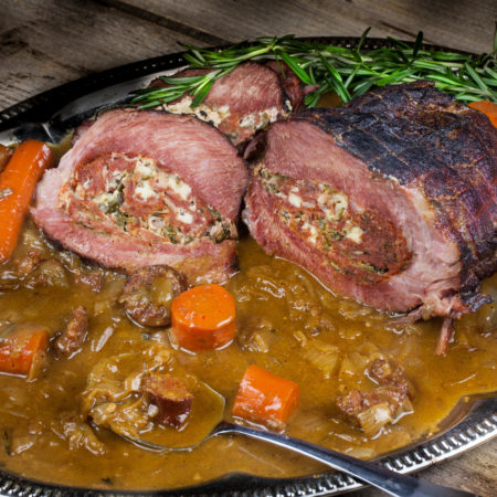 Oven-roasted pork in a rich onion gravy is a Cajun specialty. (All photos credit: George Graham)