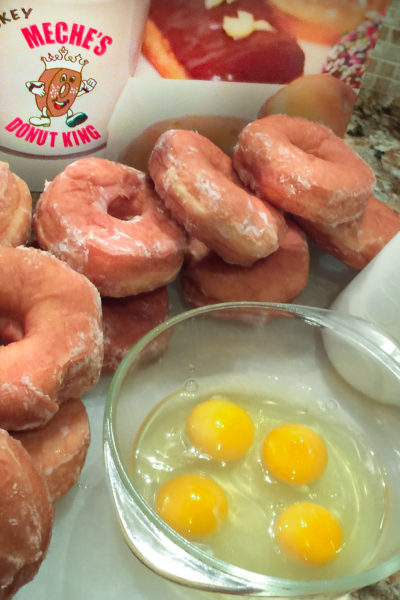 Light and airy cake donuts combine with equally rich ingredients in an easy Cajun recipe for dessert.