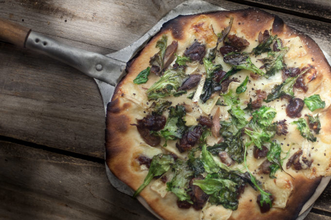 Duck-and-brie-pizza Duck combines with creamy brie cheese in this one-of-a-kind Cajun recipe for pizza. (Photo credit: George Graham)