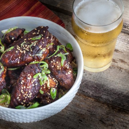 Smoky, sweet, and sticky, these glazed wings are full of Cajun flavor. (All photos credit: George Graham)