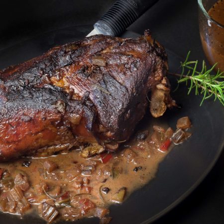 Slow-braised in Port wine, my braised lamb falls off the bone with sweet morsels of meat. (Photo credit: George Graham)
