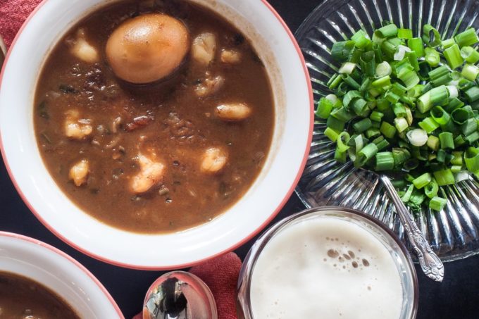 The boiled egg adds protein and soaks up the dark roux flavor.