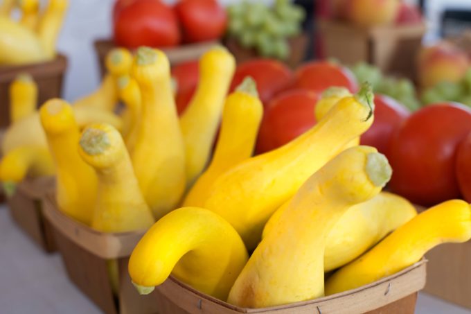 Look for the crookneck variety of yellow squash at the local farmers markets.