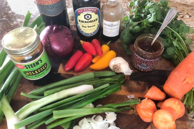 Flavorful ingredients go into the braising pot.