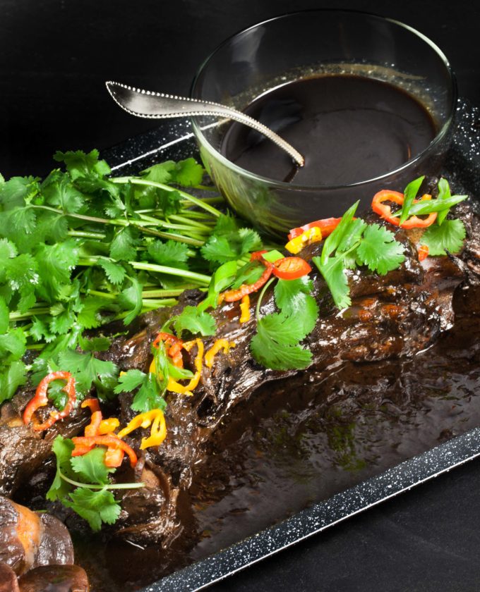 Whole Braised Oxtail with Pepper Jelly Glaze vertical Whole Braised Oxtail with Pepper Jelly Glaze is sweet and spicy.